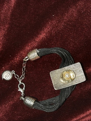 Handmade bracelet by Kostibas like new, black and gold