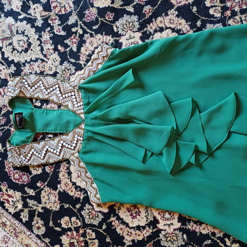 Fullah Sugah top green like new, sizes M and L