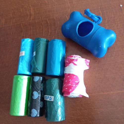 Dog bag dispenser and bags in excellent condition