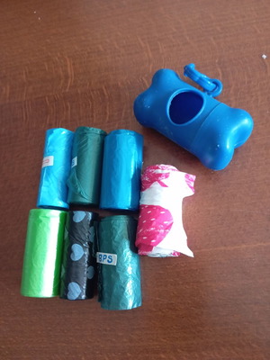 Dog bag dispenser and bags in excellent condition