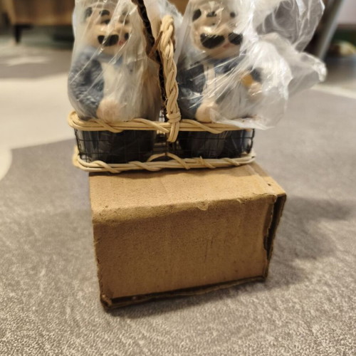Vintage salt and pepper set with chef figures in wicker basket