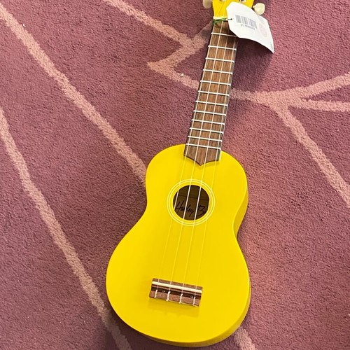 Yellow ukulele new in very good condition
