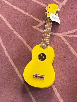 Yellow ukulele new in very good condition