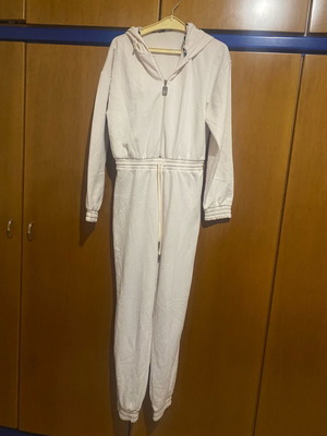 Lynne one-piece used, white with fleece lining and leopard details