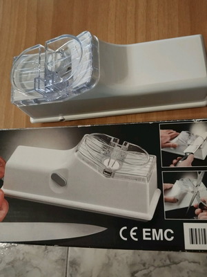 Knife and scissor sharpener machine unused, battery operated