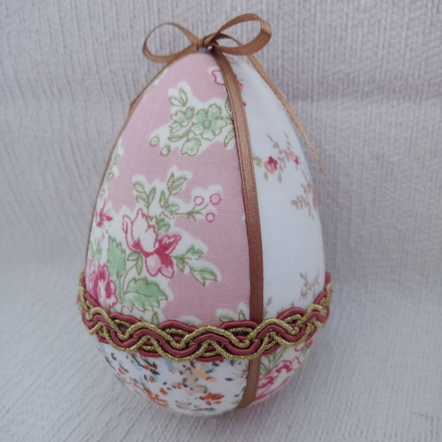 Decorative egg used beige pink floral for Easter and spring decor