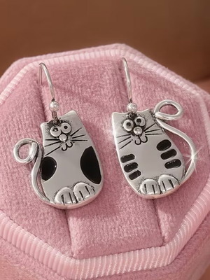 Cat earrings new with playful design