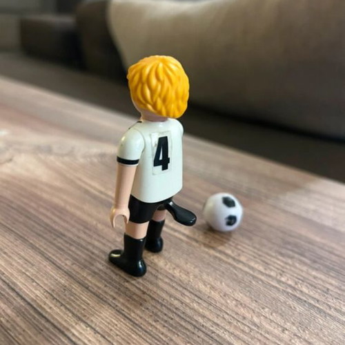 Playmobil footballer like new with faded ball