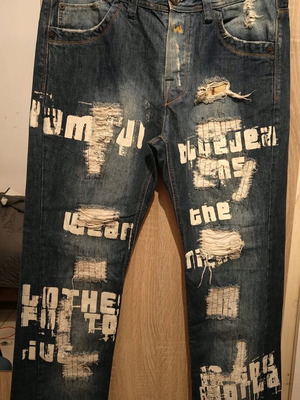Men's jeans with rips and patches used, size 36