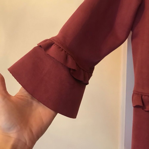 Lightweight coat in rotten apple color like new