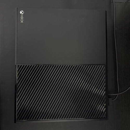 Xbox One 1TB console used with controller and 2 games