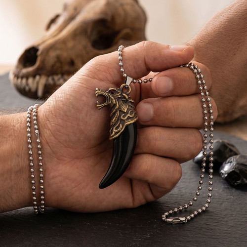 Necklace with wolf tooth pendant like new, gold and black