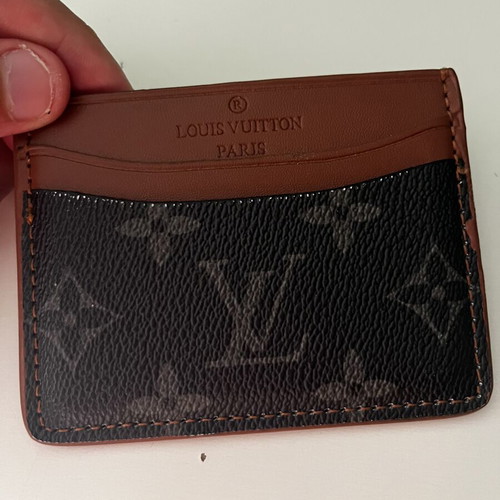 Louis Vuitton leather card holder used, black and brown