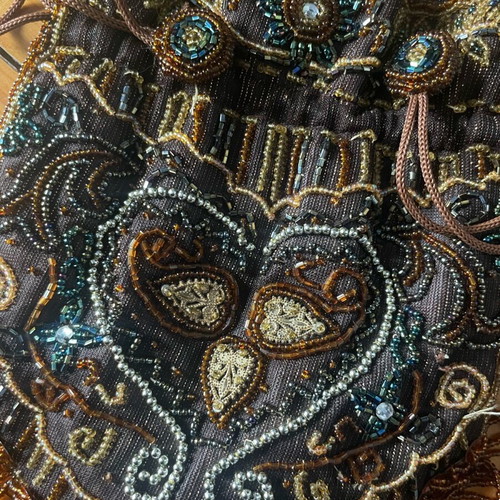 Hand-embroidered bag like new