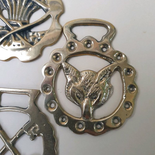 Authentic brass horse medallions set of 4 like new