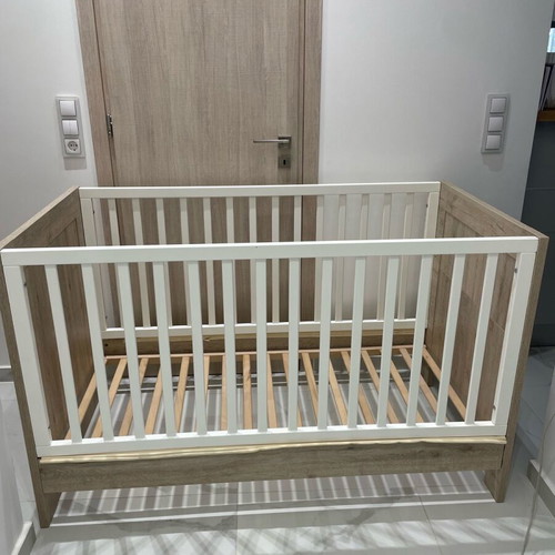 Baby cot used with mattress and linens