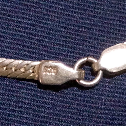 Silver 925 bracelet like new with blue eye and stones