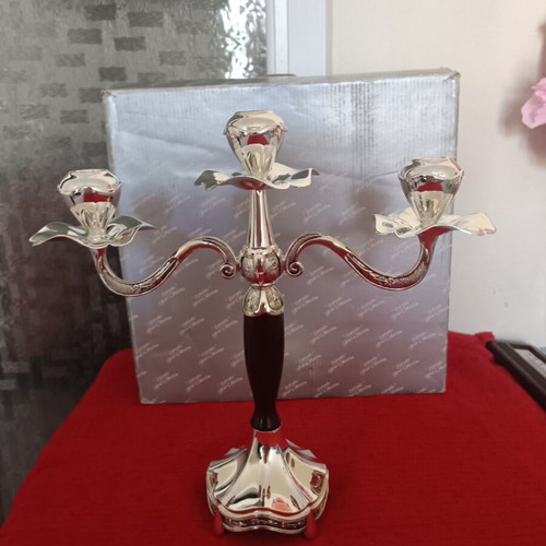 Metal candlestick silver color new with box