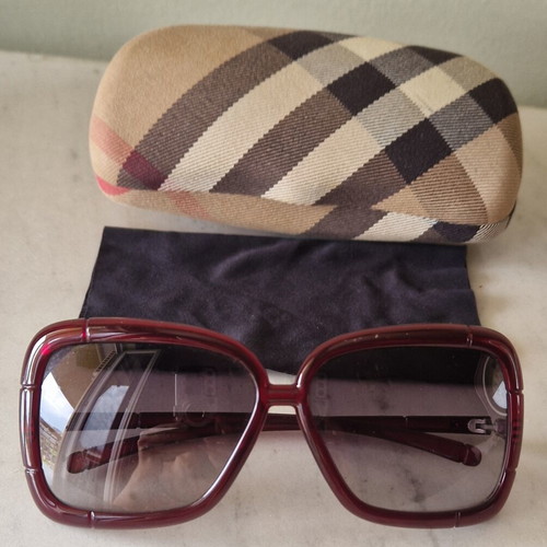 Burberry women's sunglasses used, burgundy with case