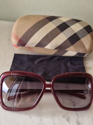 Burberry women's sunglasses used, burgundy with case