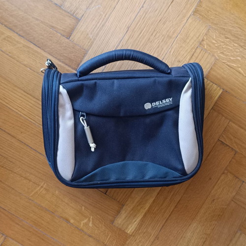Delsey Paris folding hanging toiletry bag used, blue