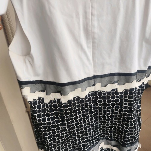Two-tone dress used with embossed details