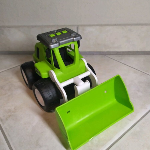 Children's tractor toy with loader used with sounds