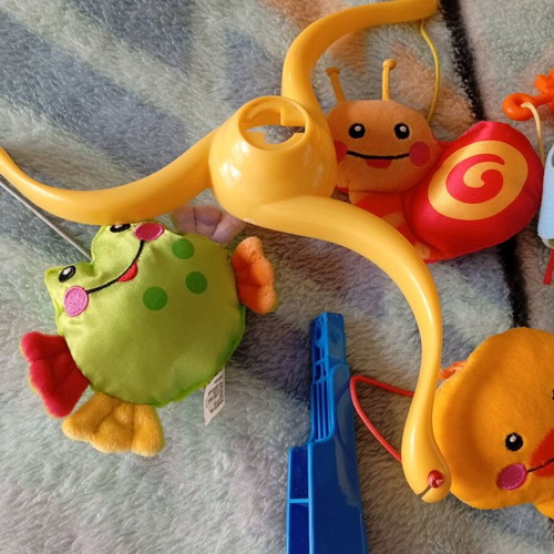 Baby toy like new for crib
