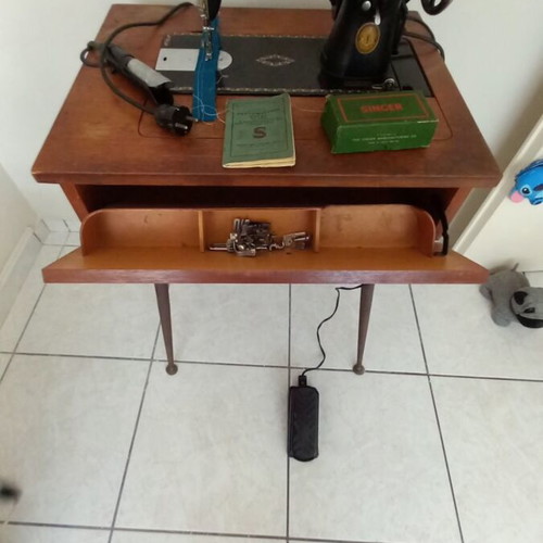 Singer sewing machine used with table