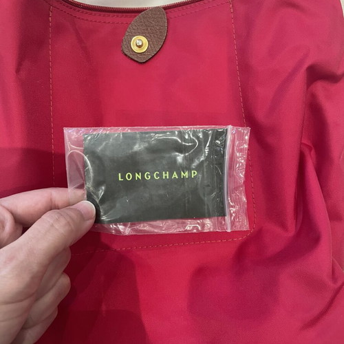 Longchamp backpack like new, red