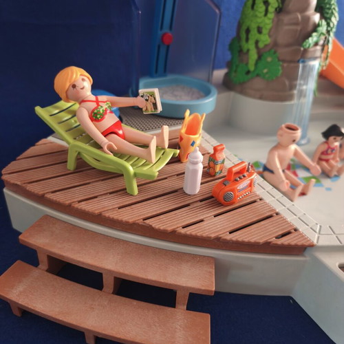 Playmobil pool with family figures and accessories