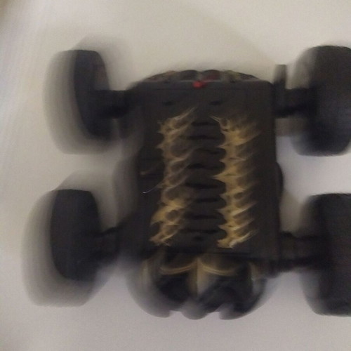 Remote control used with wheels that open to overcome obstacles