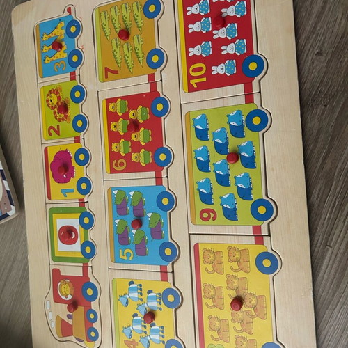 Baby learning puzzles used, 10 wooden cards
