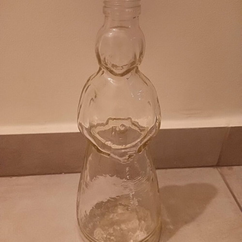 Bottle shaped like a woman, like new