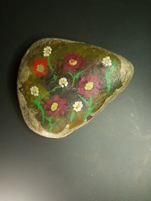Decorative stone used with painted flowers