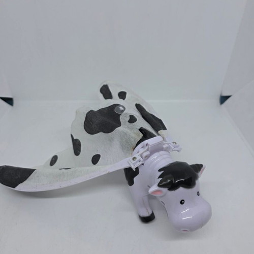 Flying cow toy used