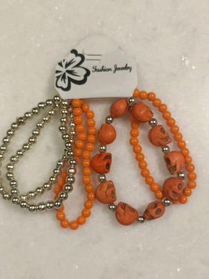 Bracelet set new with 5 pieces in gold and orange colors