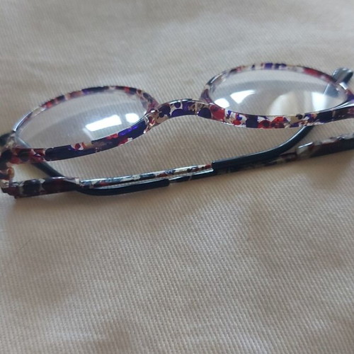 Italian children's eyeglasses with colorful tortoiseshell frame and metal temples