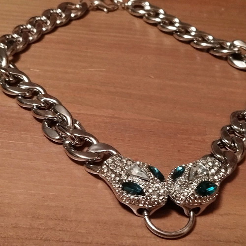 Choker necklace solid with snakes in like new condition