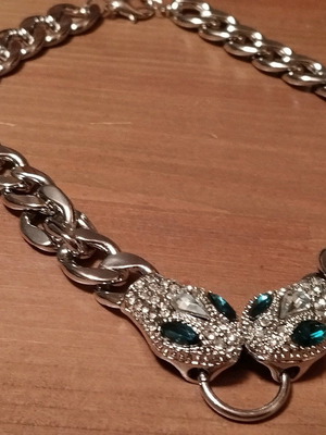 Choker necklace solid with snakes in like new condition