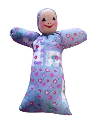 Handmade fabric doll used with floral design