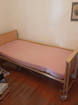 Hospital bed with electronic recline mechanism, like new, wooden sides