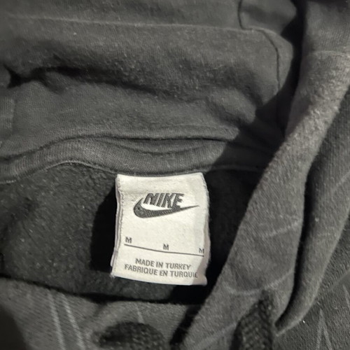 Nike black hoodie with Swoosh pattern, medium