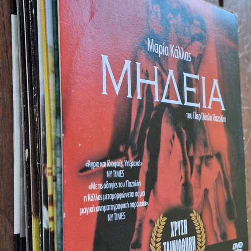 Golden DVD case with 11 DVDs like new, subtitles included