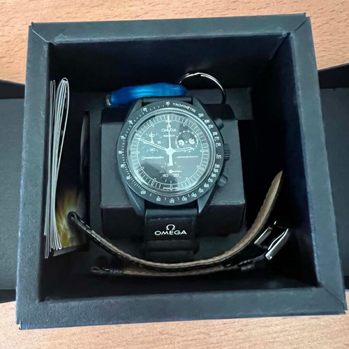 Swatch MoonSwatch Mission to the Moonphase watch, black and white