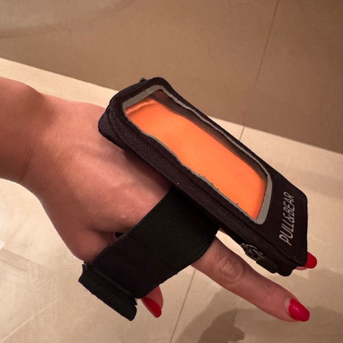 Phone armband case like new, black and orange