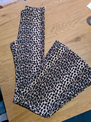 Leopard bell-bottom pants like new, size S