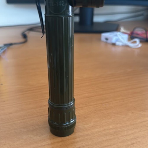 Handheld and pocket flashlight used, with clip and red filter