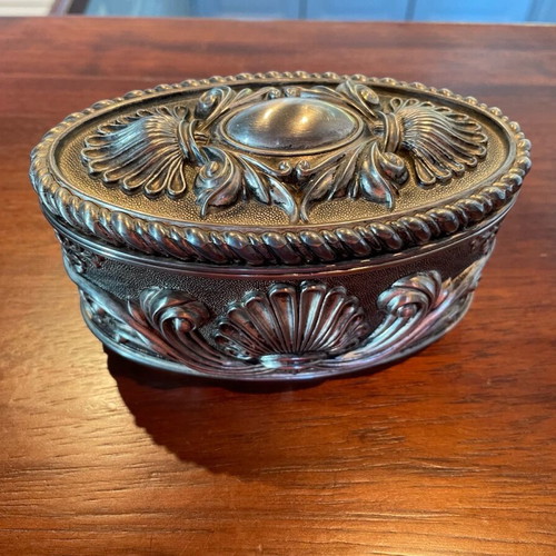 Vintage silver-plated jewelry box new with embossed designs and blue velvet