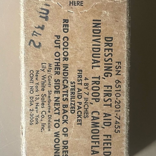 Military triangular bandage used, sealed for collectible use